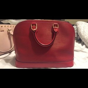 Louis Vuitton red Alma hand bag